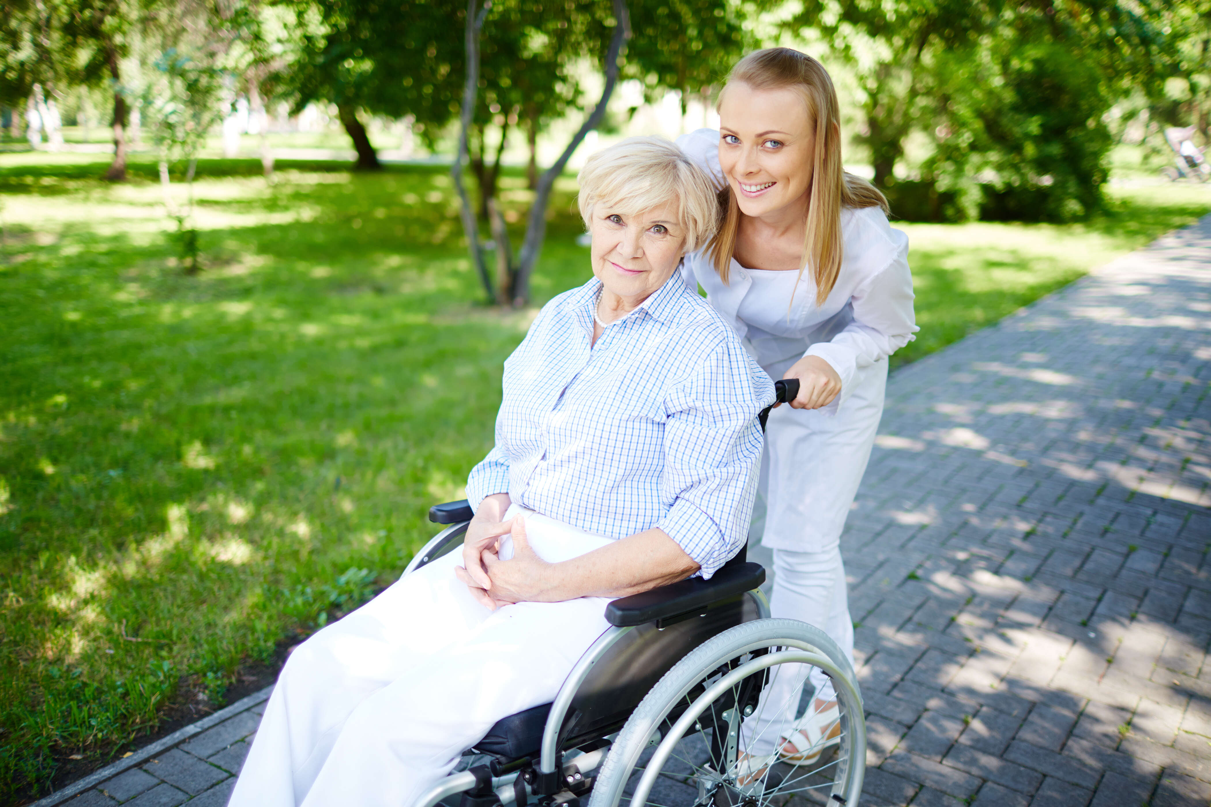 female caregiver walking with se