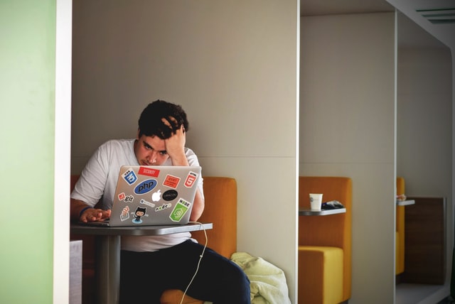 frustrated man on laptop